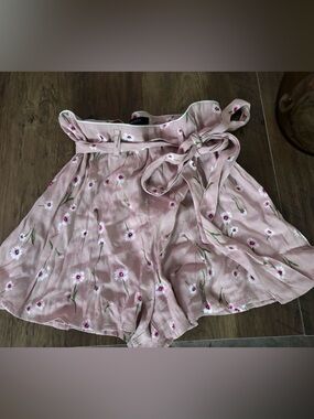 Pink flowy shorts with flowers